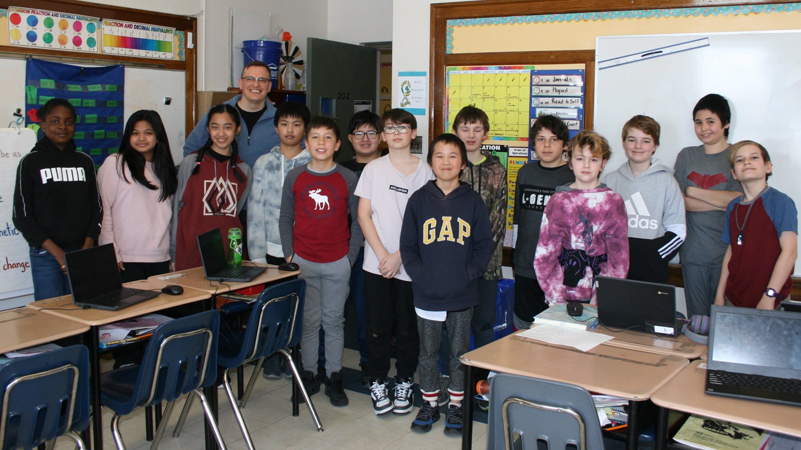 Grade 6 students at River Elm School with their teacher Dustin Beniston.